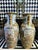 Gigantic pair of Chinese porcelain floor vases featuring famille rose decoration with hand-painted figural court scenes,...