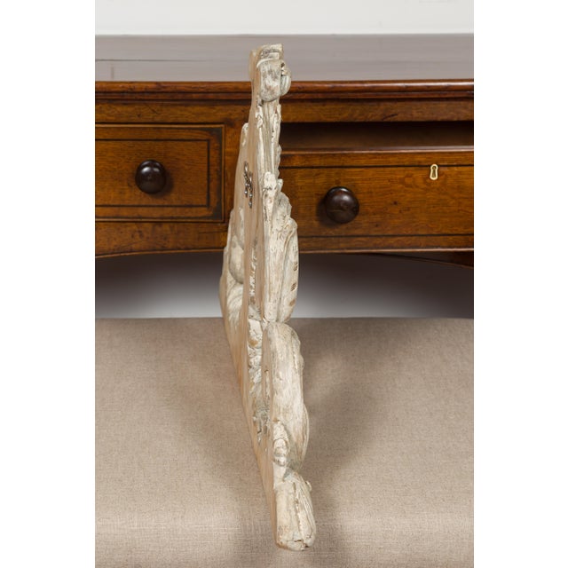 An Italian Rococo style painted wood architectural fragment from the late 19th century, with carved acanthus leaves,...
