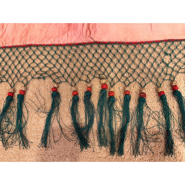 Remarkable and very large ceremonial Chinese embroidered hanging. Late Qing.A horizontal sequence of individual people...