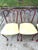 Set of 4 Woodard Furniture iron chairs in original paint and upolstery. Quality American made, sturdy chairs, with open...