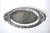 A vintage oblong serving platter with an ornate raised design of acorns and oak leaves around the border and handles; with...