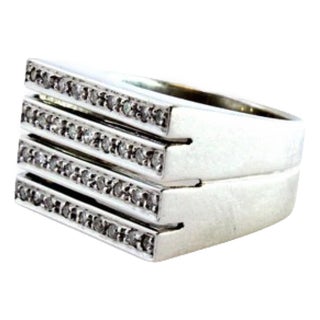 White Gold Ring with Four Bands of Brilliant-Cut Diamonds and Flat Table For Sale