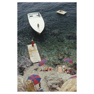 Slim Aarons, Coming Ashore, Estate Stamped Photographic Print, 1973 / 2020s For Sale