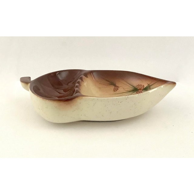 Mid-century acorn shaped ashtray with pinecone decoration, ashtray has original label from Rocky Mountain Pottery in...