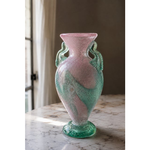 This exceptional 1980s Murano glass amphora-shaped vase represents a certified masterpiece of Venetian postmodern...