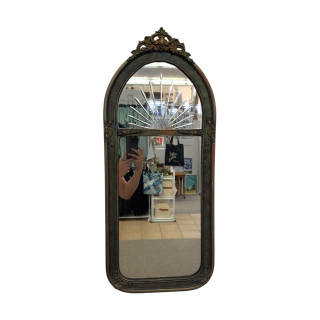 Vintage arched pier wall mirror, a spectacular blend of Hollywood Regency glam and old-world antique elegance. This tall...