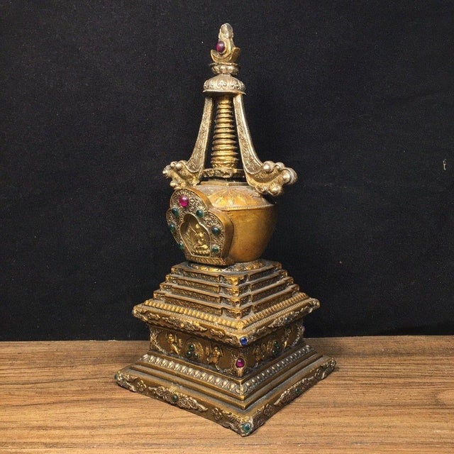 This is an exquisite vintage Tibetan bronze stupa, also known as a chorten, crafted from gilt copper with vibrant...