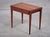 Elegant Danish side table from the 1960s, crafted in teak and featuring a drawer with beautifully executed dovetail...