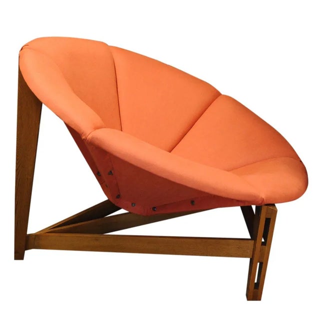 A large fibreglass flower armchair with newly upholstered pink and yellow upholstery. This piece is attributed to the...