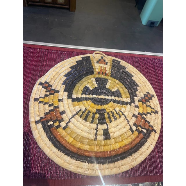 Hopi handwoven polychrome plaque with “Crow Mother “ design with wall hanger loop Multicolor coil Circa 1940 to 1950...