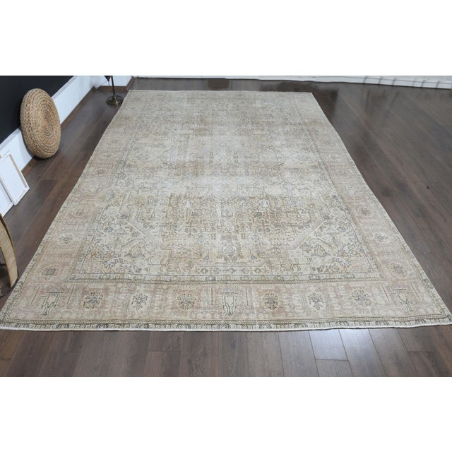 Vintage Persian Hand-Knotted area rug is a semi-antique vintage area rug. The '70s Eastern region of Anatolia's unique rug...