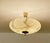 Large Art Deco pendant light with a mottled ivory beige glass shade with darker veins, mounted on a brass rod and canopy...