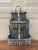 A beautifully woven early 20th century American splint oak double hanging basket painted in soft gray tones with a tightly...