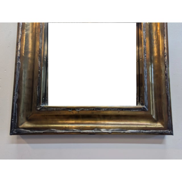 French Brutalist Mid Century Artisan Brass & Copper Mirror, handmade. Hand hammered shaped Brass with Raw weld detail. The...