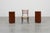 A rare and sculptural pair of Italian Art Deco nightstands, crafted in richly figured walnut circa 1920. Each piece...
