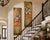 A striking pair of coordinating monumental hand-painted floral trompe l’oeil panels, likely dating to the late 20th...