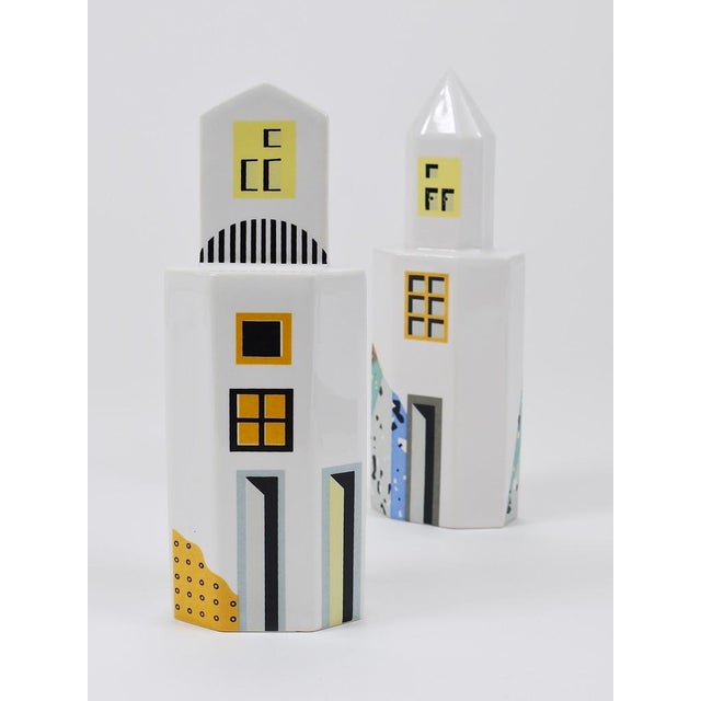 A pair of beautiful and decorative postmodern Skyscraper Pop Art salt and pepper shakers, designed in 1990 by artist and...