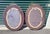 Fabulous pair large oval wall mirrors. Features gilded mirrored frames. Large beveled mirror in the center composite...
