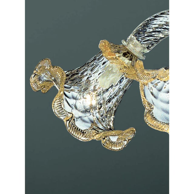 Venetian Floral “Rigadin” Murano Glass Chandelier full of gold Leaf inside. Venetian Romantic transparent and gold Floreal...