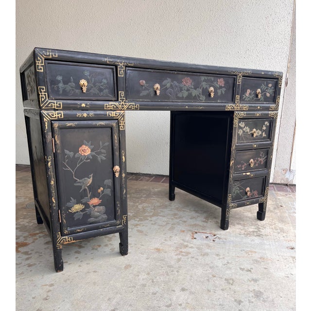 This gorgeous chinoiserie style desk is beautiful all the way around. From its intricate hard-stone inlay top, to its...