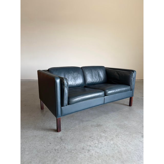 Vintage Danish Navy Blue leather two seat sofa. Unmarked, attributed to Borge Mogensen c 1971, Model 2332. A clean classic...
