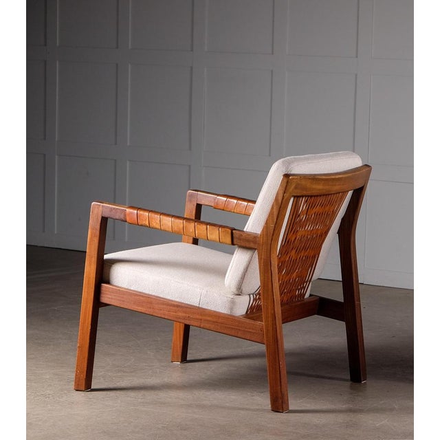 Rare armchairs model "Rialto" by Carl-Gustav Hiort af Ornäs, Finland, 1950s. Leather covered armrests, back with braided...