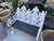 Antique Style Cast Aluminum Garden Benches, 20th c., the canted relief figural double medallion back to pierced scrolled...