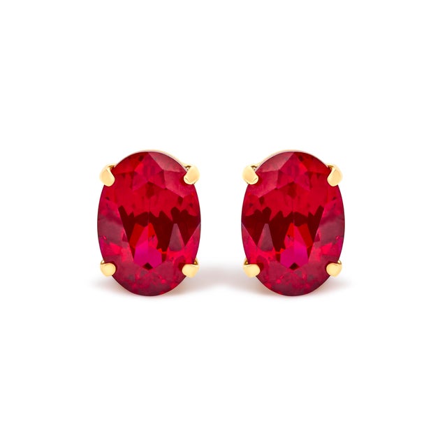 A whisper of timeless romance, these luminous studs marry the warmth of 18K yellow gold with the vivid heartbeat of ruby....