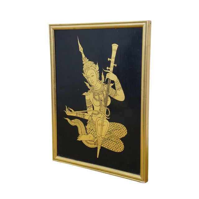 Vintage Thai Lai Rot Nam gilded black lacquer Manimekhala wood art panel. Manimekhala is the Guardian Goddess of the Sea,...