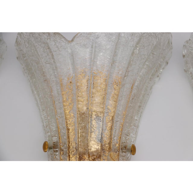 Date: 1970. Country: Italy. Material: Murano Glass and Brass Wall Sconce. Item condition: There is some oxidation and...