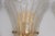 Date: 1970. Country: Italy. Material: Murano Glass and Brass Wall Sconce. Item condition: There is some oxidation and...