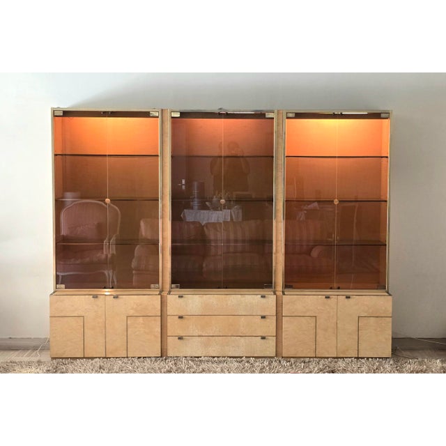 A set of three modular display cases designed by jean-claude mahey for roche bobois in the 1970s. the structure is made of...