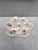 Majolica oyster plate with different flowers on each shells, circa 1900 signed Longchamp.