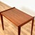 Side table manufactured in Denmark in the 1950s-60s. It is made of teak wood on the structure and veneered on the top. The...