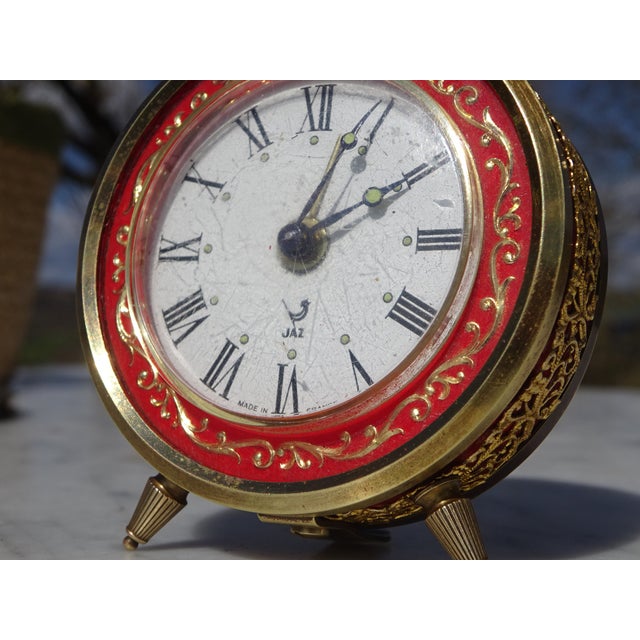 Vintage manual-winding alarm clock with a loop and chime. Model manufactured in France between 1968 and 1970. White dial...