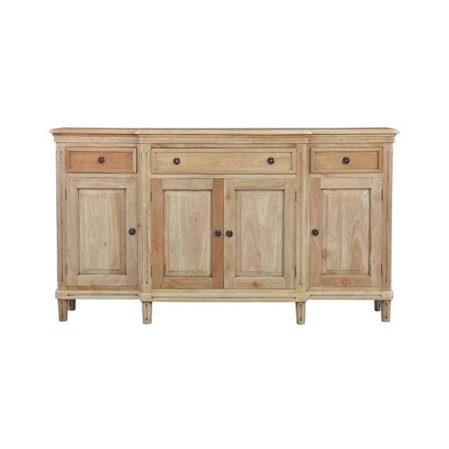 Perfectly blending vintage aesthetics with practical functionality, this credenza is finished in a light Fruitwood...