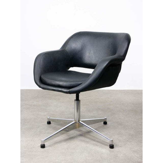 Beautiful swivel chairs from the 70s made of leatherette and chrome frame. Perfect for a vintage office feel. Adjustable...