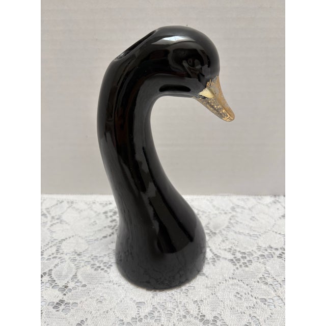 Fun and unusual petite black swan ceramic bud vase with gold beak. Sweet and classically elegant for any day pop of...