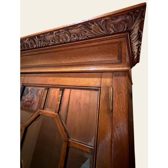 Antique Quarter-Sawn Oak Beveled Glass Display Cabinet, circa 1900–1915 Impressive antique quarter-sawn oak double-door...
