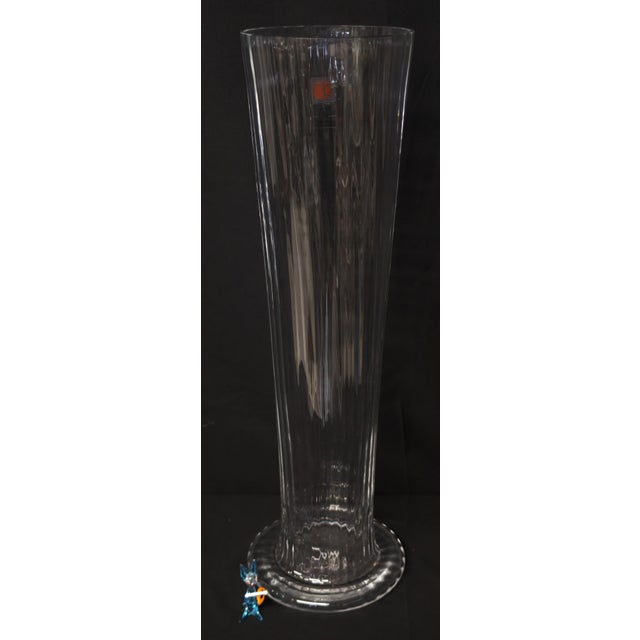 An imposing and rare vase by Carlo Moretti, crafted from transparent Murano glass/crystal with a refined vertical cane...