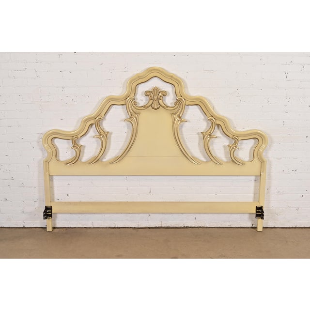 A gorgeous French Rococo or French Provincial Louis XV style king size headboard By Romweber USA, Circa 1950s Solid carved...
