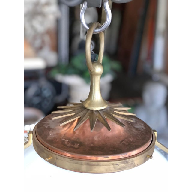 This is an absolutely amazing light! It has such charm to it and it truly captures the mid century style, art deco style,...