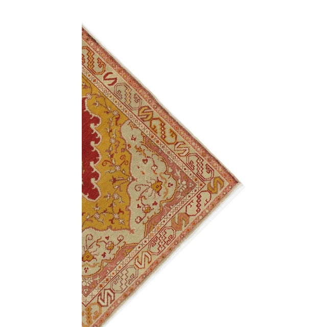 Vintage Turkish rug, handwoven circa 1940, featuring a striking medallion and border design in rich terracotta and multi-...
