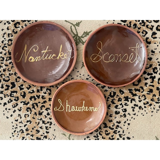Set of three Redware pottery plates each having a different place/village from the Island of Nantucket on them -...