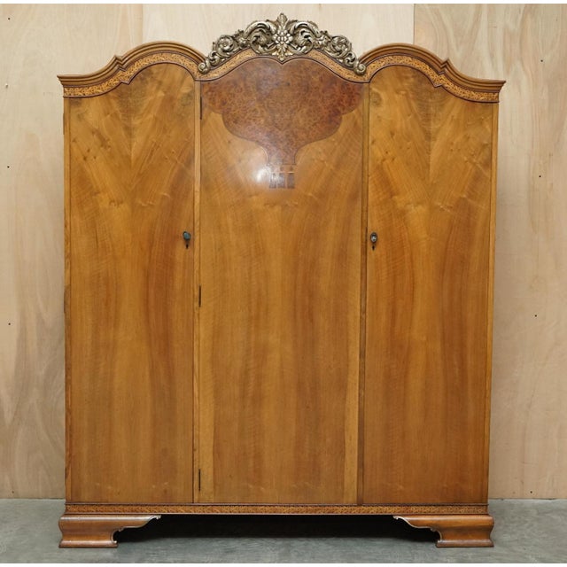Waring & gillow lancaster, burr walnut inlaid wardrobe which is part of a suite. This piece is part of a bedroom set, i...