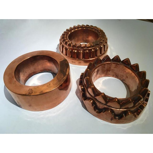 These pudding molds are a set composed by three nice France pieces fine hand made in copper. One of these has a crown...