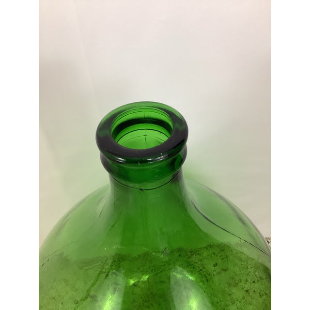 Emerald green 54 liter Italian demojohn. Sourced in northern Italy, this gorgeous 20th century vintage wine bottle...
