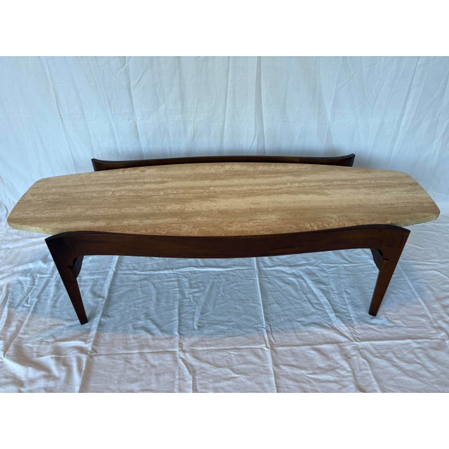 This Bertha Schaefer for Singer & Sons Travertine Table is a stunning piece of 1960s Danish Mid Century Modern furniture....
