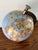 Handsome Contemporary blue globe with a solid brass meridian. Stands on a conical wooden base. Please see dimensions and...