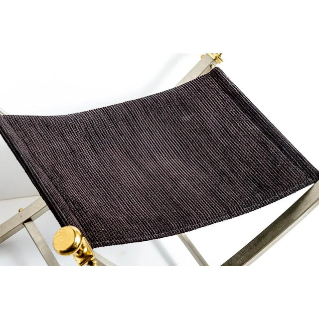 Rare Maison Jansen Brass and Steel Folding Campaign style Stool, made in Italy for Maison Jansen, C.1950-1960 This stool...